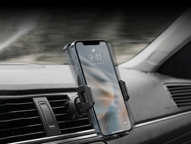 Traditional phone holder attached to a car air vent