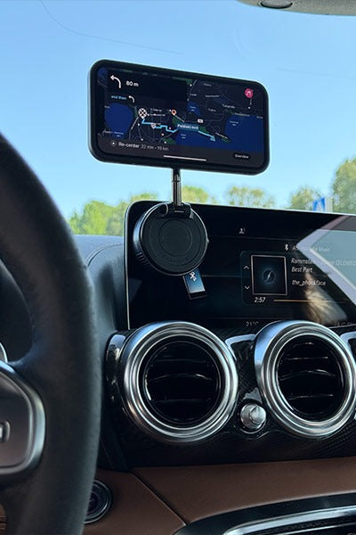 Versatile phone holder that can be attached anywhere