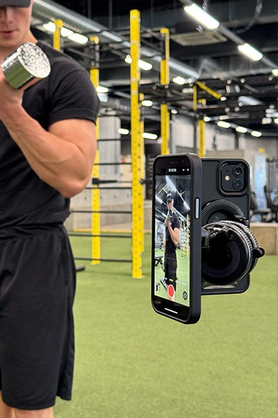 Versatile phone holder that can be attached anywhere