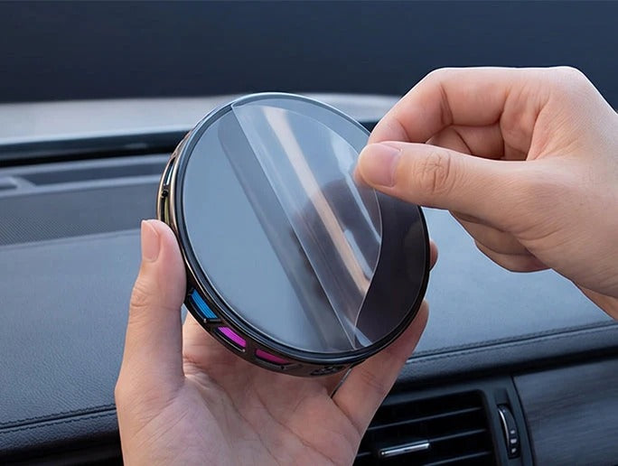 Peeling the protective film from the mount base