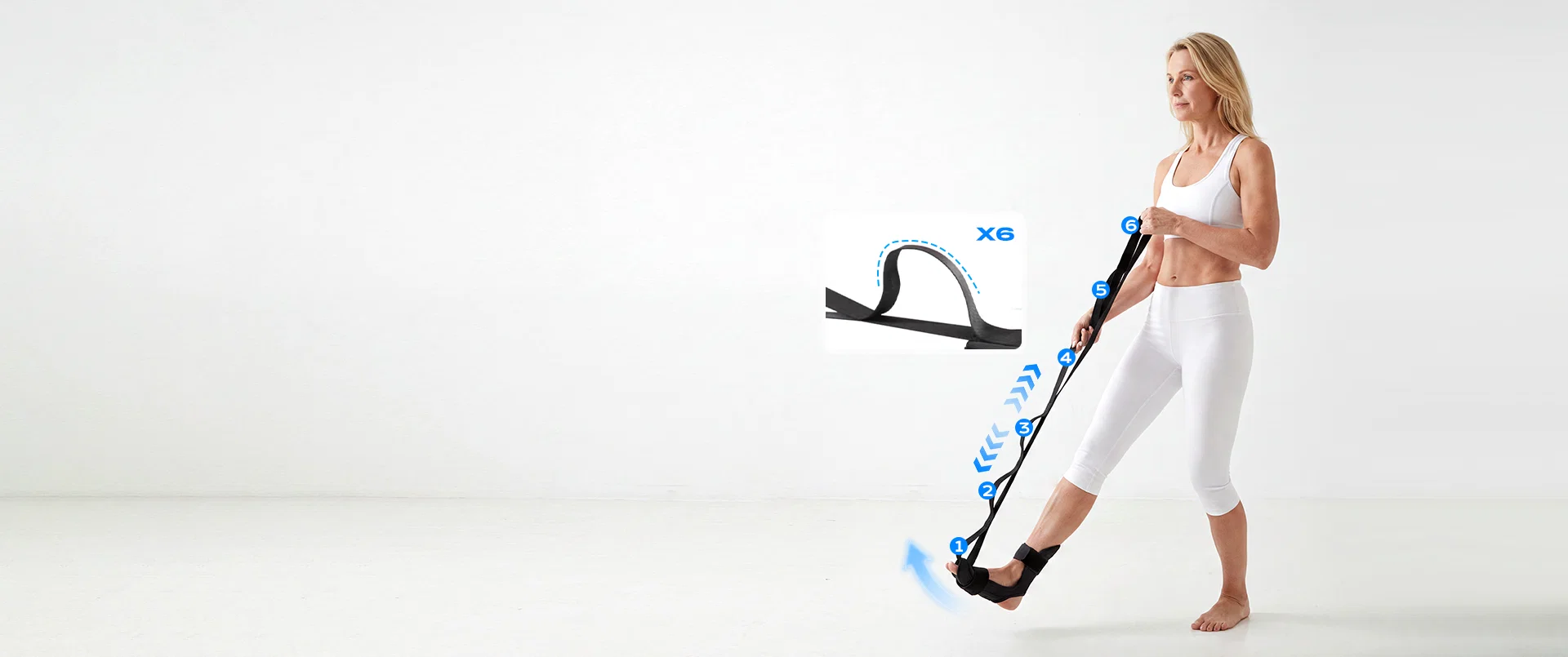 Woman using a stretching strap with six numbered handles