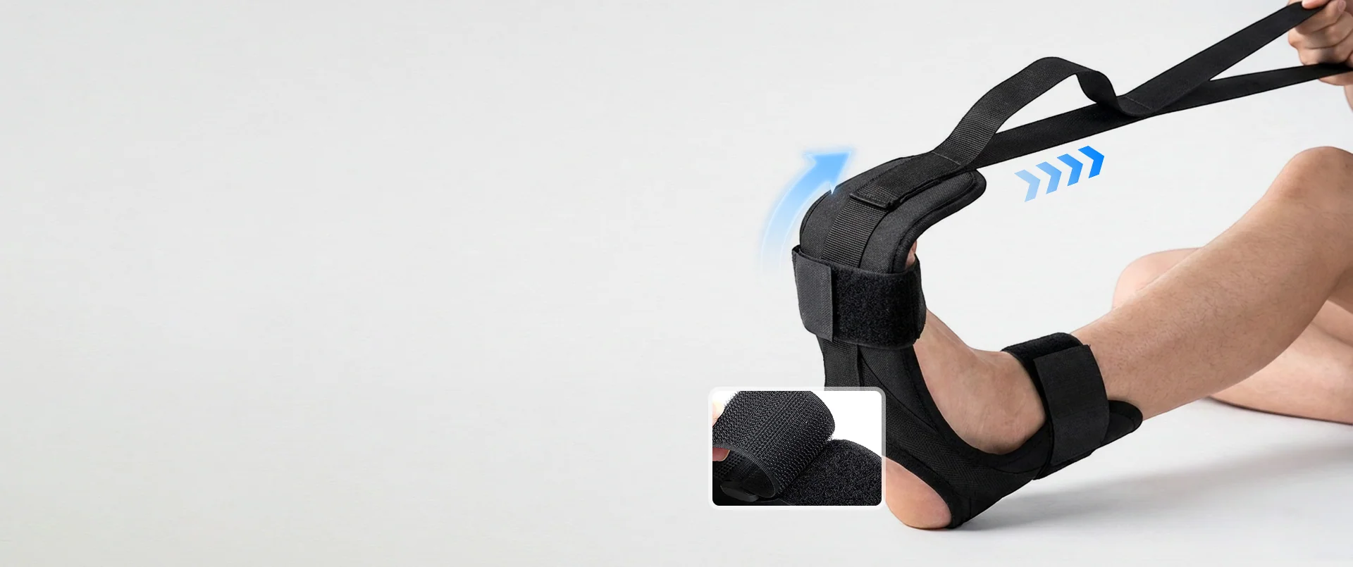Close-up of the stretching strap around a foot with a fabric detail inset